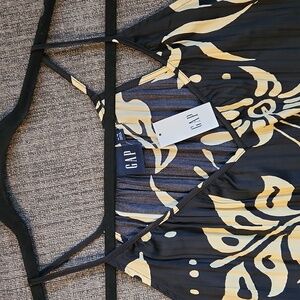 Elegant cami- style top. Never worn.